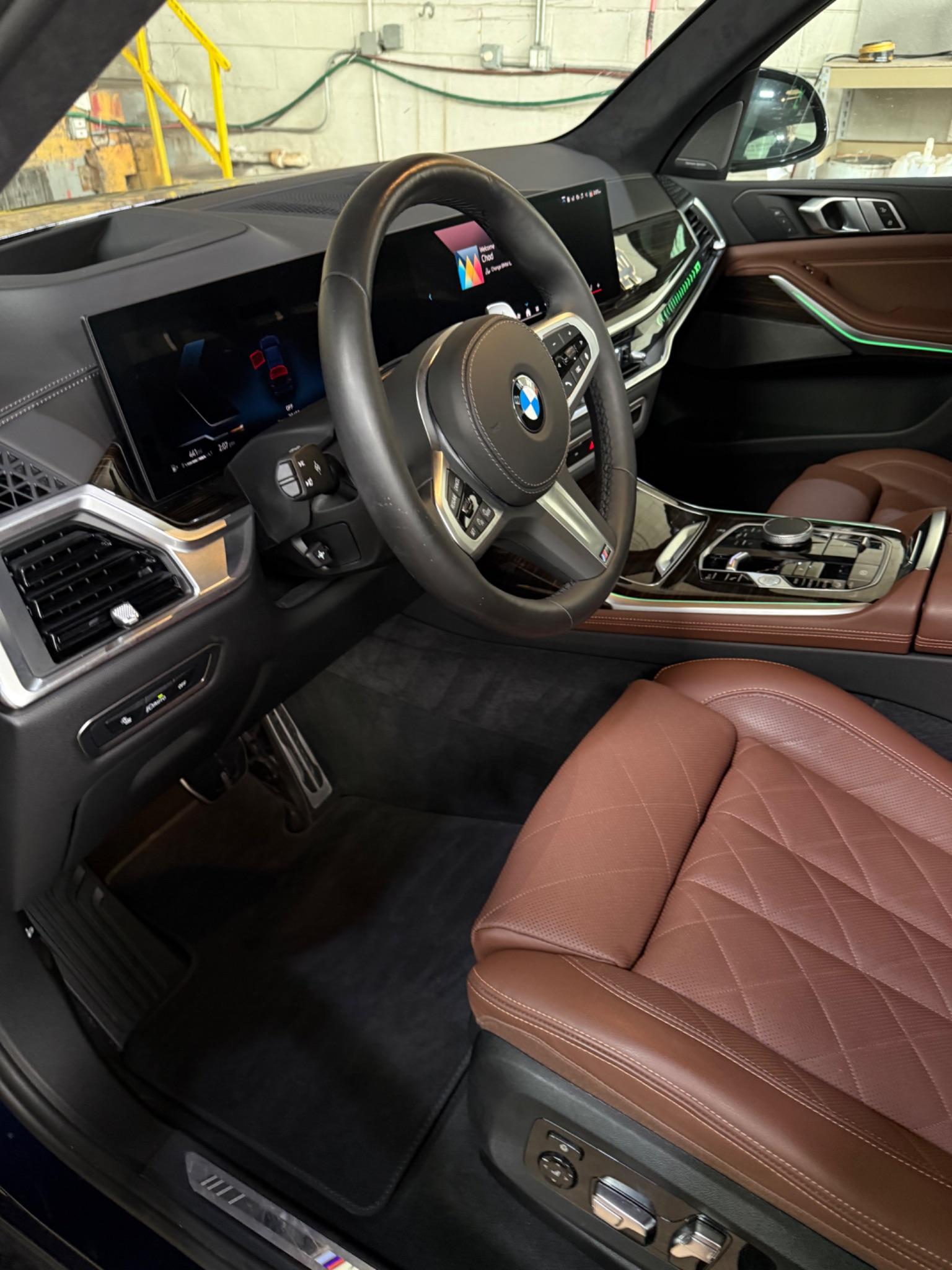 Detailed BMW interior with clean brown leather seating