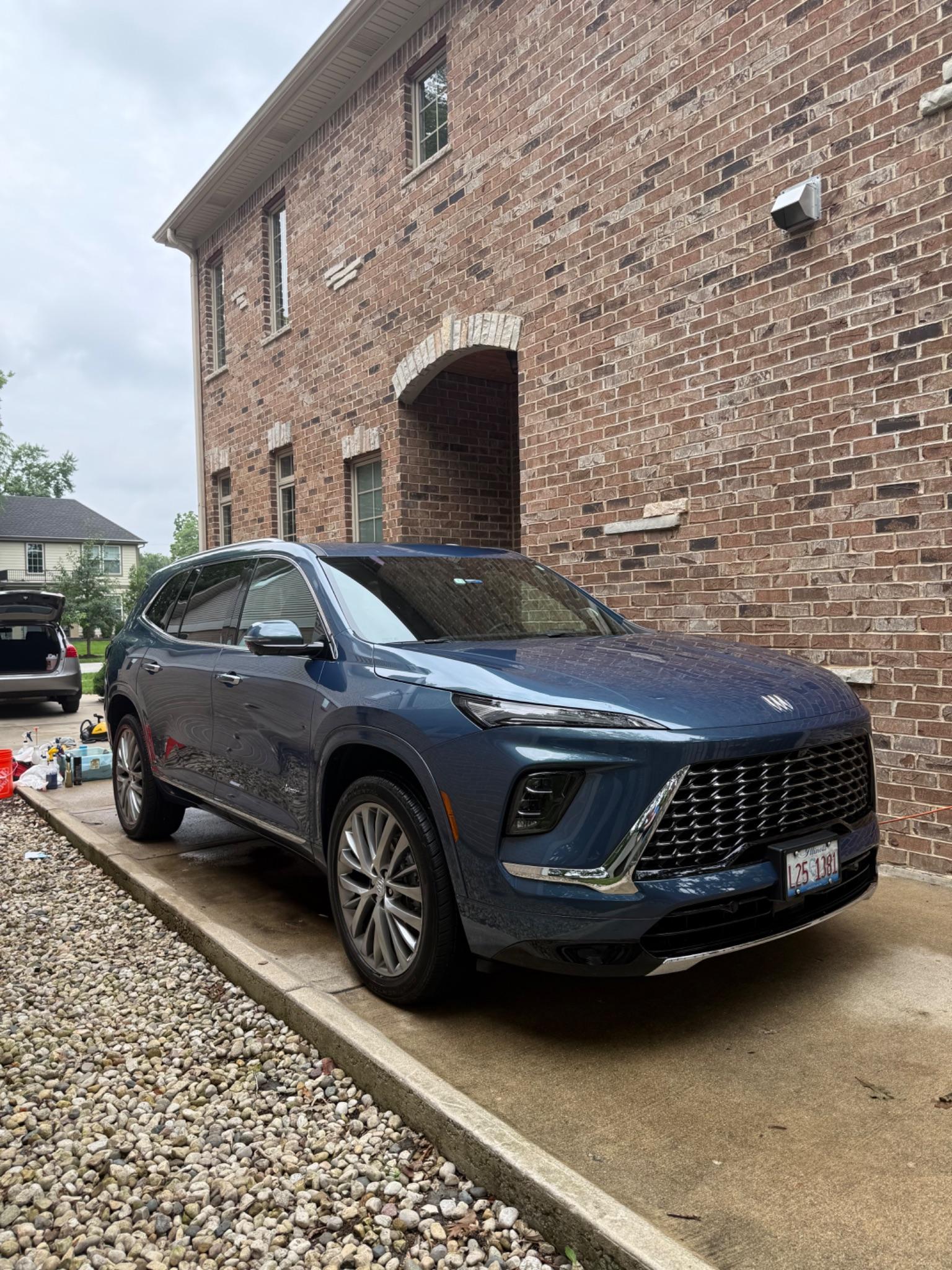 Dark SUV with a polished exterior after detailing